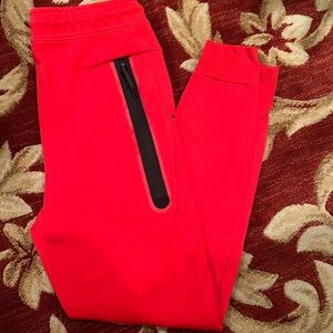 Red nike tech sweatpants